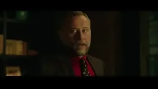older man's face with beard and serious expression — John Wick
