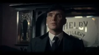 Man in suit by "Melby Millinery" sign — Peaky Blinders