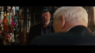 elderly man in black suit and hat in store — Now You See Me