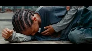 woman lying on ground in distress — The Karate Kid