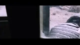 Man holding gun in dark room — Iron Man