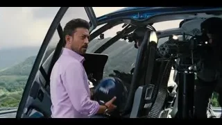 man sitting in helicopter cockpit — Jurassic World