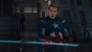 Captain America sitting at desk — The Avengers