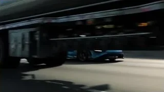 blue sports car driving on highway — Sports Cars