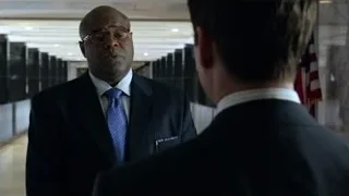 two men talking in hallway — Suits