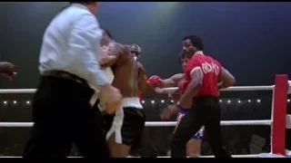 Men fighting in boxing ring — Rocky III