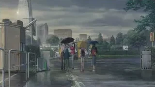 group of people with umbrellas in rain — Weathering with You