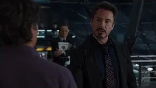 Man in suit in tense conversation — The Avengers