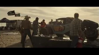 race car on sandy beach — F1