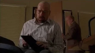 bald man with tablet, another man watching — Breaking Bad