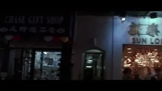 UO Food Corp entrance at night — American Psycho