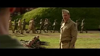 man in uniform with soldiers marching — Hacksaw Ridge
