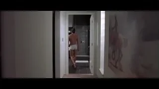 Hallway with painting of man on horse — American Psycho
