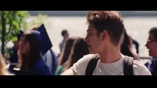Young man with backpack smiling on street — The Amazing Spider Man 2