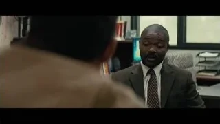 two men conversing in office — Interstellar