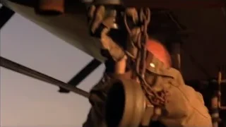 man working on metal machinery — Breaking Bad