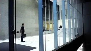 modern high-rise building with glass facade — Suits