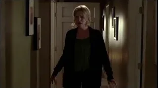 Woman standing distressed in hallway — Breaking Bad