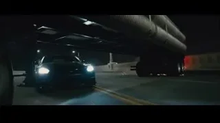 red truck driving on street at night — Furious Seven