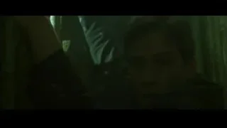 Person in dark room, eyes closed — The Matrix