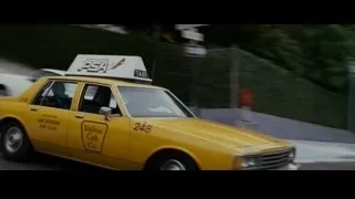 Yellow taxi cab driving on street — The Persuit of Happyness