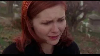 red-haired woman's face in cemetery — Spider Man