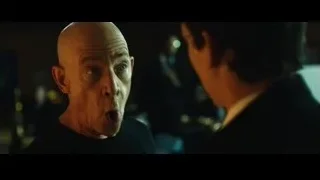 two men conversing in dimly lit bar — Whiplash