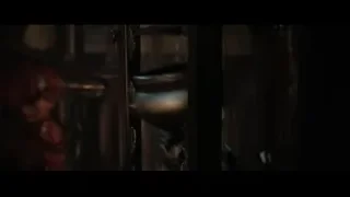 red-haired woman looking out glass door — Doctor Strange 2