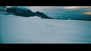 Man standing on snowy mountain peak — The Secret Life of Walter Mitty