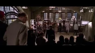 Group of people in museum room — Spider Man 2