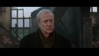 elderly man in black coat in abandoned building — Batman