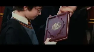 father and son looking at 3D model — Harry Potter and the Philosophers Stone