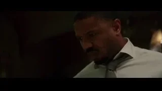 man with closed eyes in dimly lit room — Creed 3