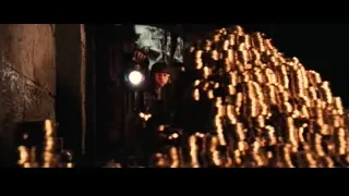 Man standing in front of pile of gold coins — Harry Potter and the Philosophers Stone