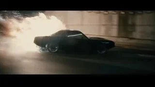 black sports car with smoke and flames — Furious Seven