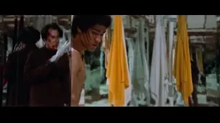 Bloody man looking at mirror in room — Bruce Lee: Enter The Dragon