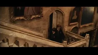 Three children on ornate staircase in grand room — Harry Potter and the Philosophers Stone
