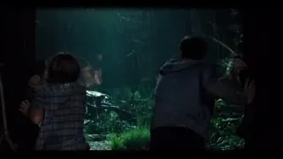 Boy and girl looking at dark aquarium — Jurassic World