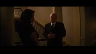 three people in dimly lit hallway — Batman: The Dark Knight Rises