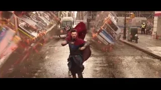 man in red cape on street — Doctor Strange 2