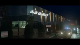 Stark Industries building lit up at night — Spiderman: No Way Home