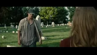 Man and woman in cemetery — Superman: Man of Steel