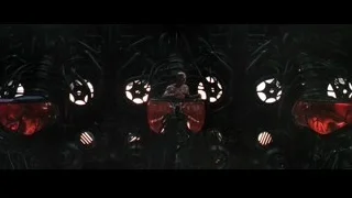 person on red chair holding gun in dark room — The Matrix
