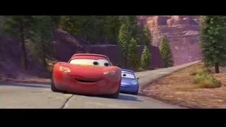 Lightning McQueen driving on winding mountain road — Cars