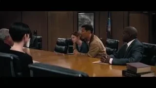 People in formal attire at conference table — Interstellar