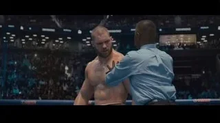 shirtless man fighting in boxing ring — Creed 2