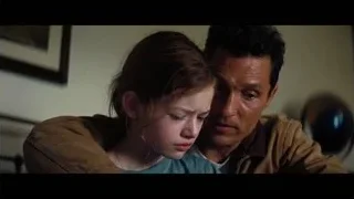 Man and girl sitting with sad expression — Interstellar