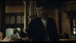 young man pouring champagne at bar — Peaky Blinders