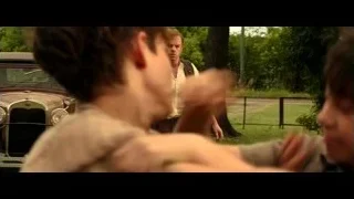 Two boys fighting in grassy field — Hacksaw Ridge
