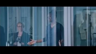 Group of people in office with man in suit — The Big Short